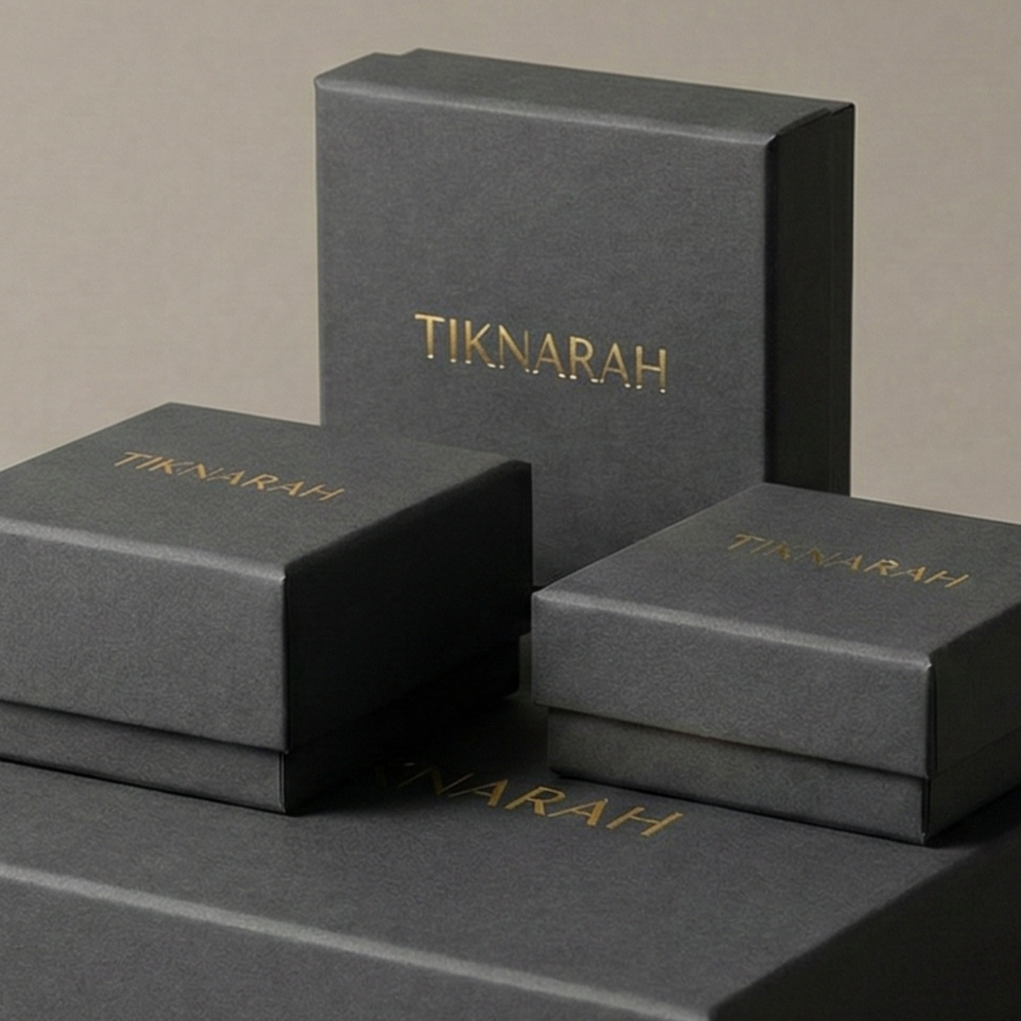 Gray boxes with 'TIKNARAH' branding on a beige background