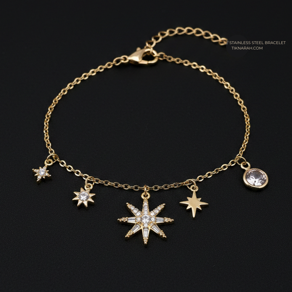Gold bracelet with star-shaped charms on a black background Anti tarnish bracelet, premium quality gold plated bracelet, stainless steel jewellery, trendy bracelet, adjustable charm bracelet, gifts for her, everyday wear