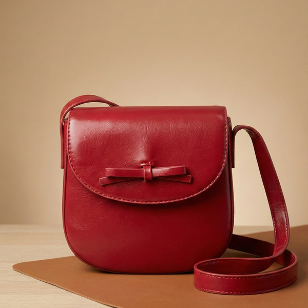 Red leather handbag with a bow on a beige background red crossbody bag
small red purse
red shoulder bag
red handbag
bag with bow